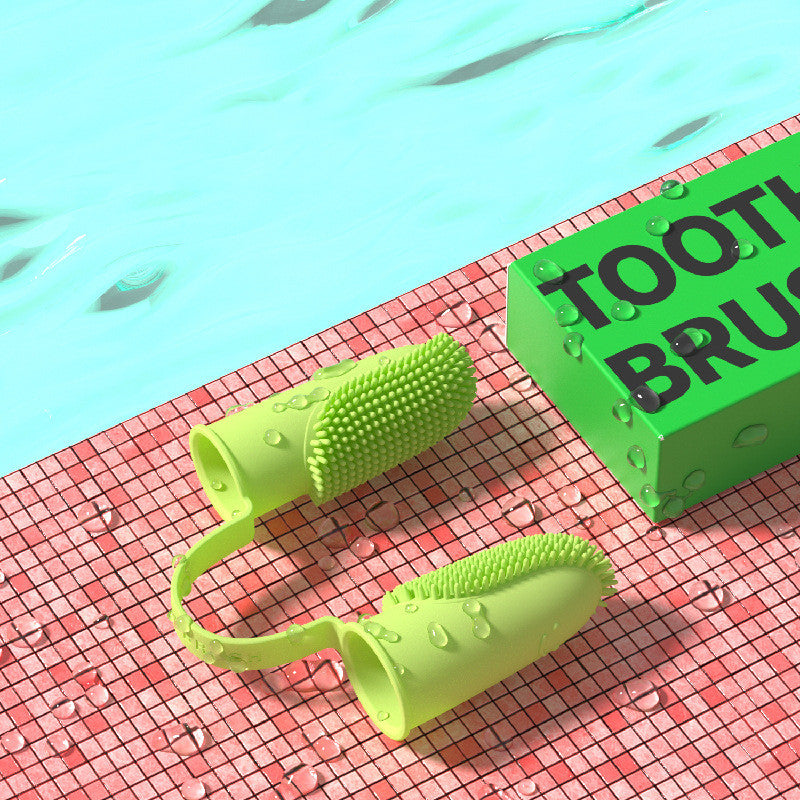 Finger toothbrush in use on dog